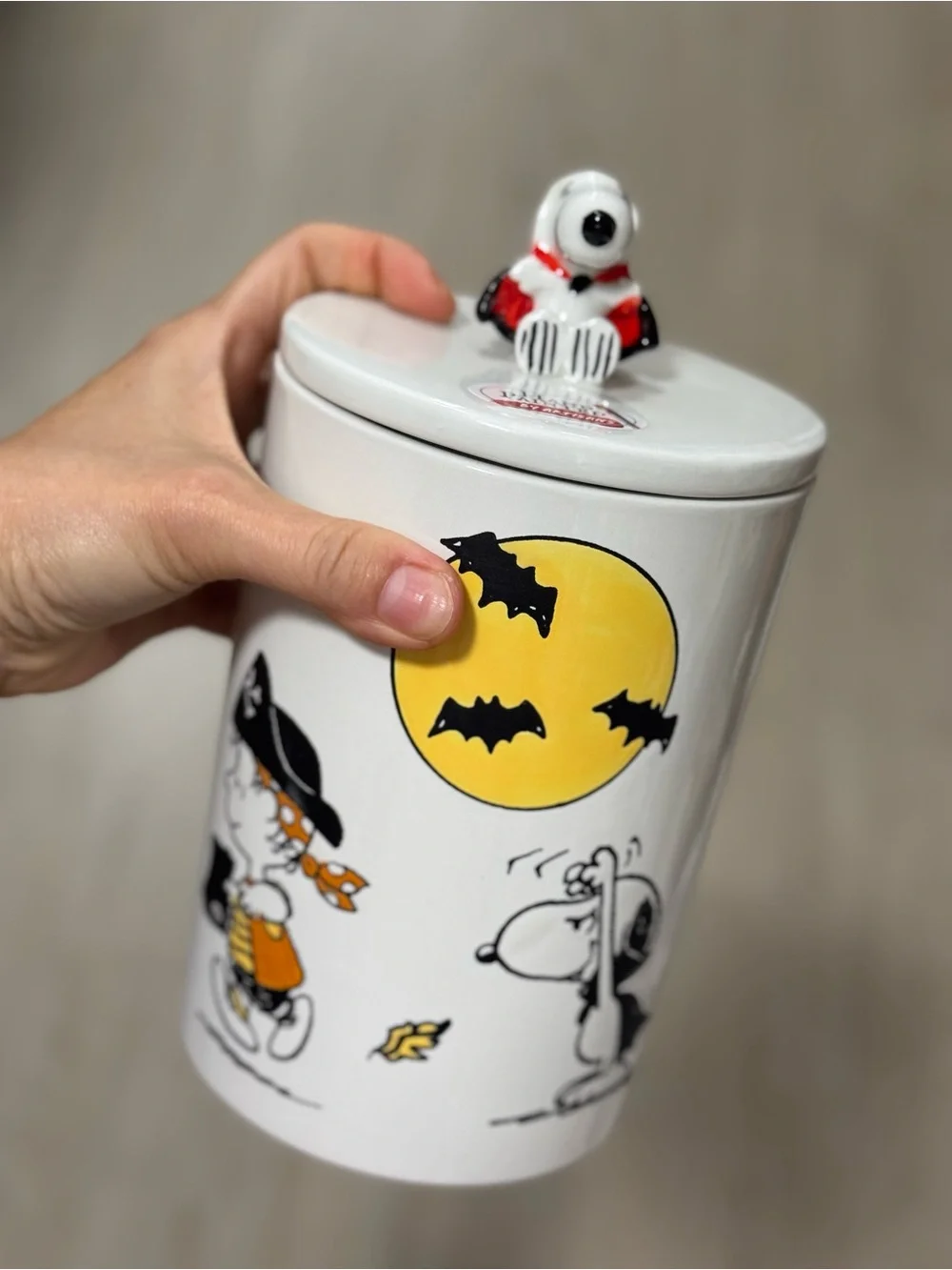 Peanuts White Ceramic Canister with Yellow Moon and Black Accents